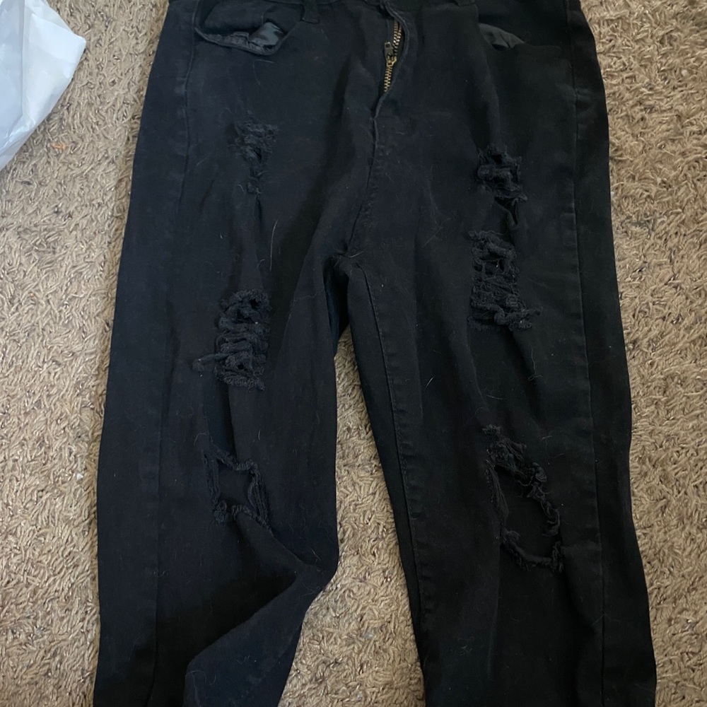 black ripped jeans